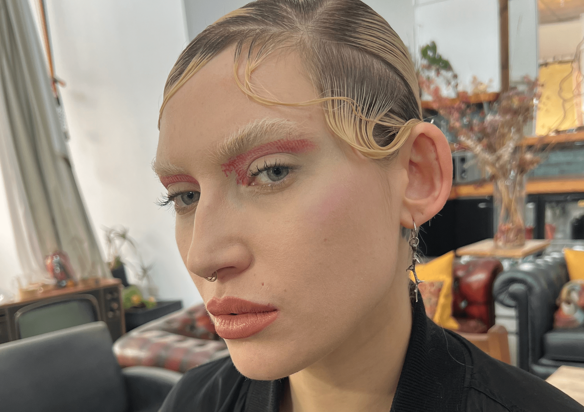 Coral liner with sculpted bleached brows