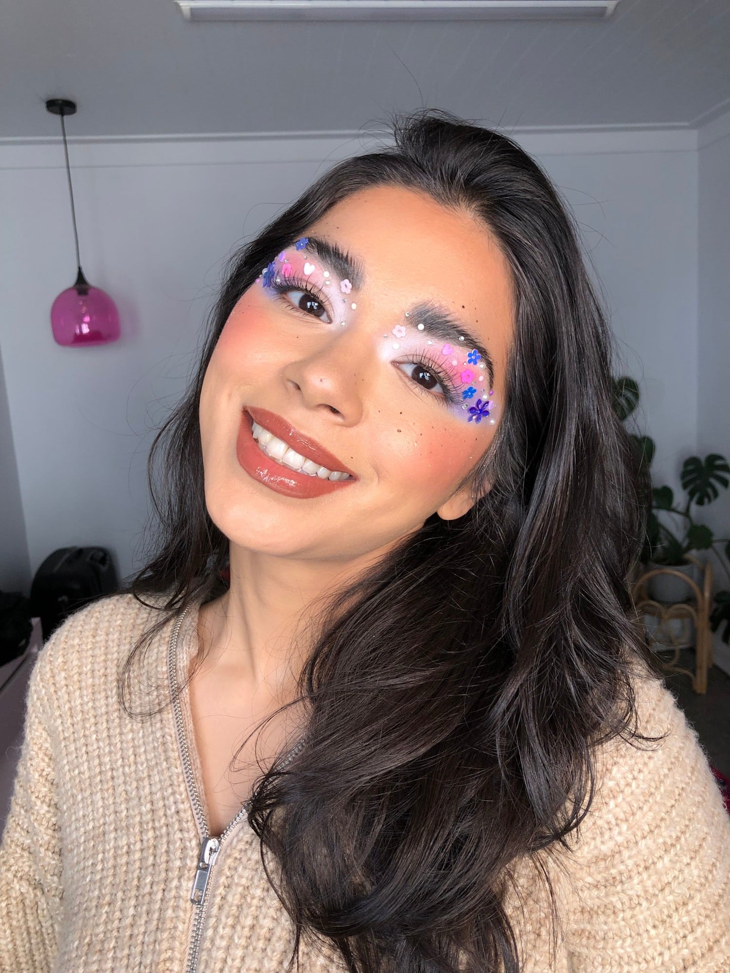 Lilac and pink floral eye with gems and a warm lip