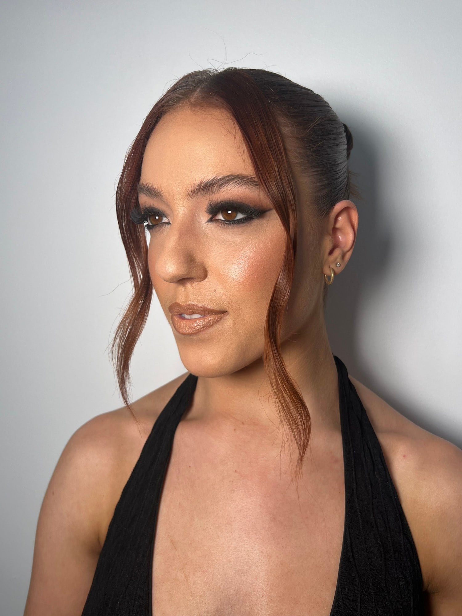 Soft glowing bridal makeup with a nude lip