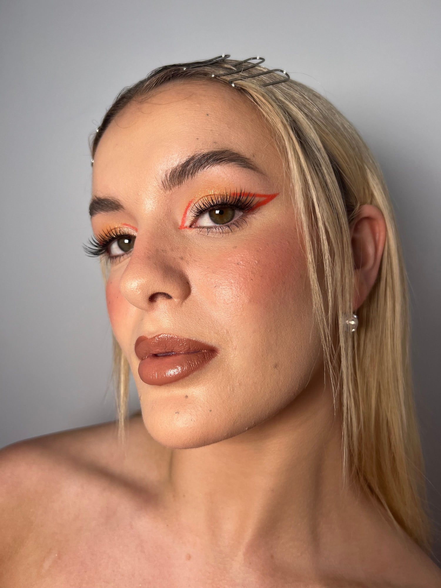 Bride with a warm coral eye and glossy lip, Melbourne wedding